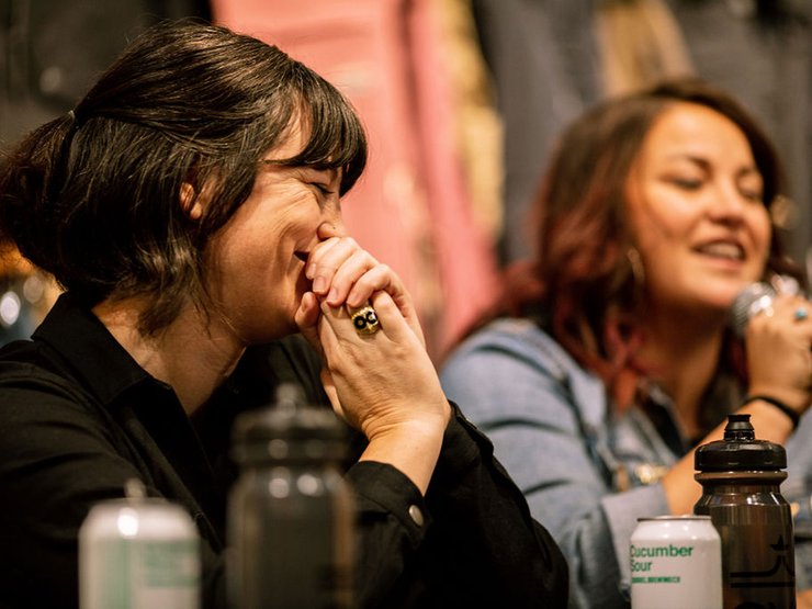 Anon Optics Global Marketing Manager Hillary Sherman and Burton Sr. Product Manager Lesley Betts having fun on the mic.