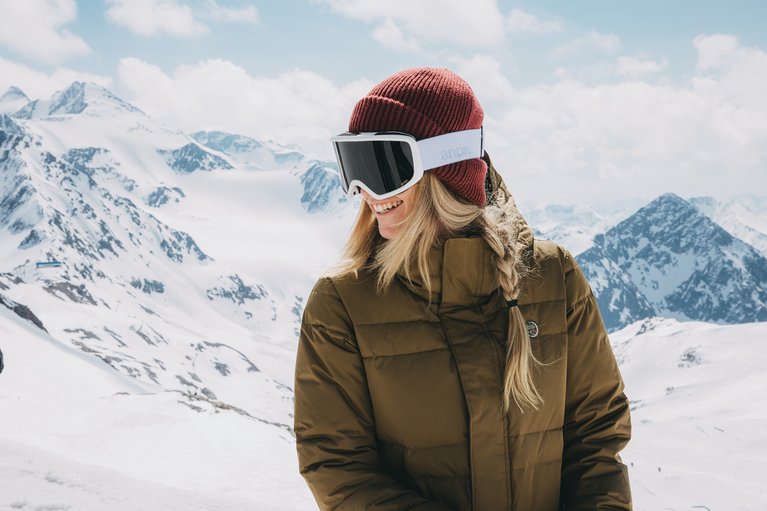 A Snowboarder Wearing a Super Warm Burton Jacket Featuring Responsibly Sourced Down
