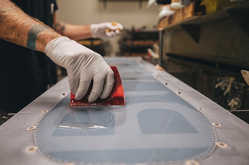 Step 1 in the layup process, pressing up a brand new Custom.