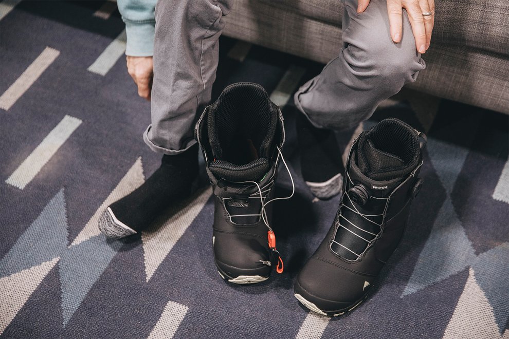 snowboard-boot-sizing-buyers-guide-trying-on-with-socks.jpg