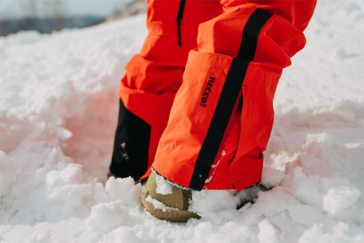 RECCO avalanche rescue system: Burton snowboard pants with a RECCO reflector visible on the back of the lower leg.