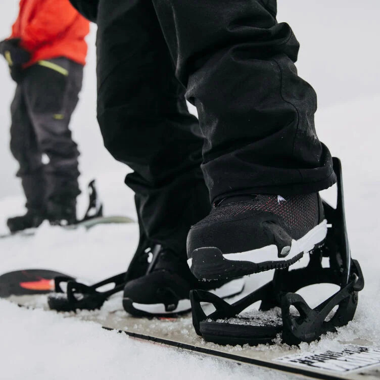 Person on hill stepping into Step On® bindings