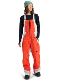 Product image of Women's Burton Reserve GORE-TEX 2L Bib Pants[Variant:Fiesta Red / Gray Cloud]