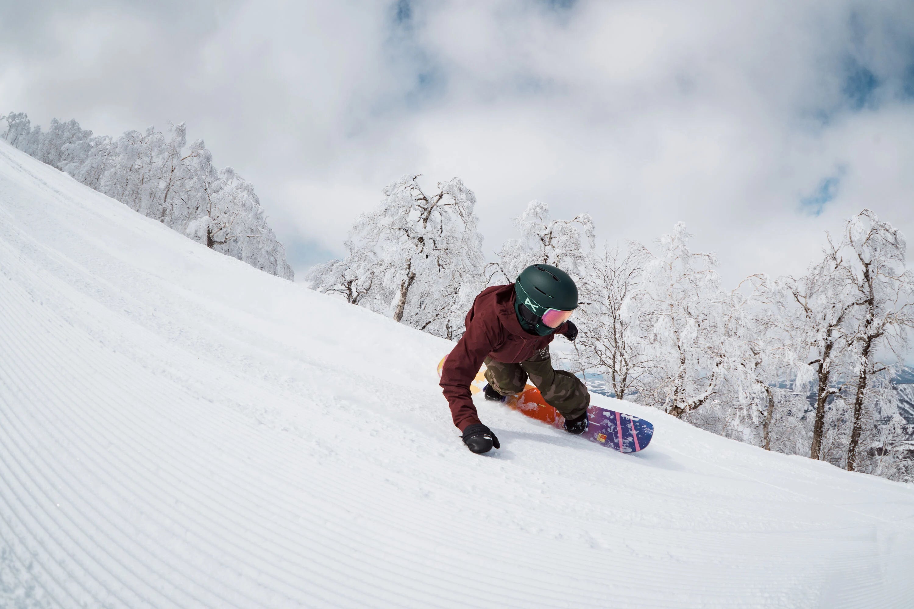 Snowboard riding at Rusutsu in Japan