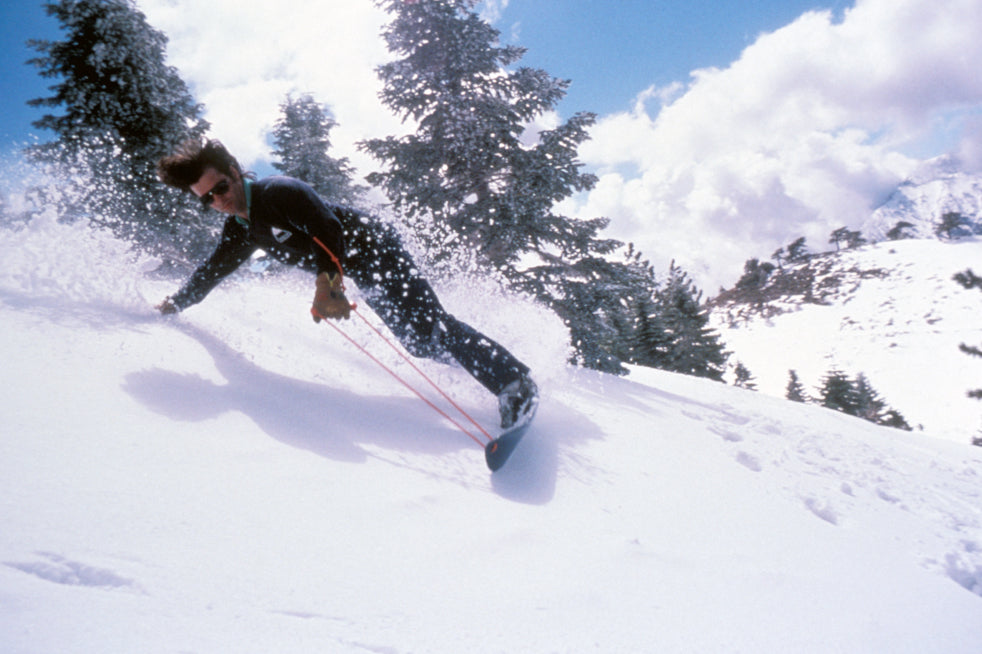 Jake riding an old Burton board in 1983