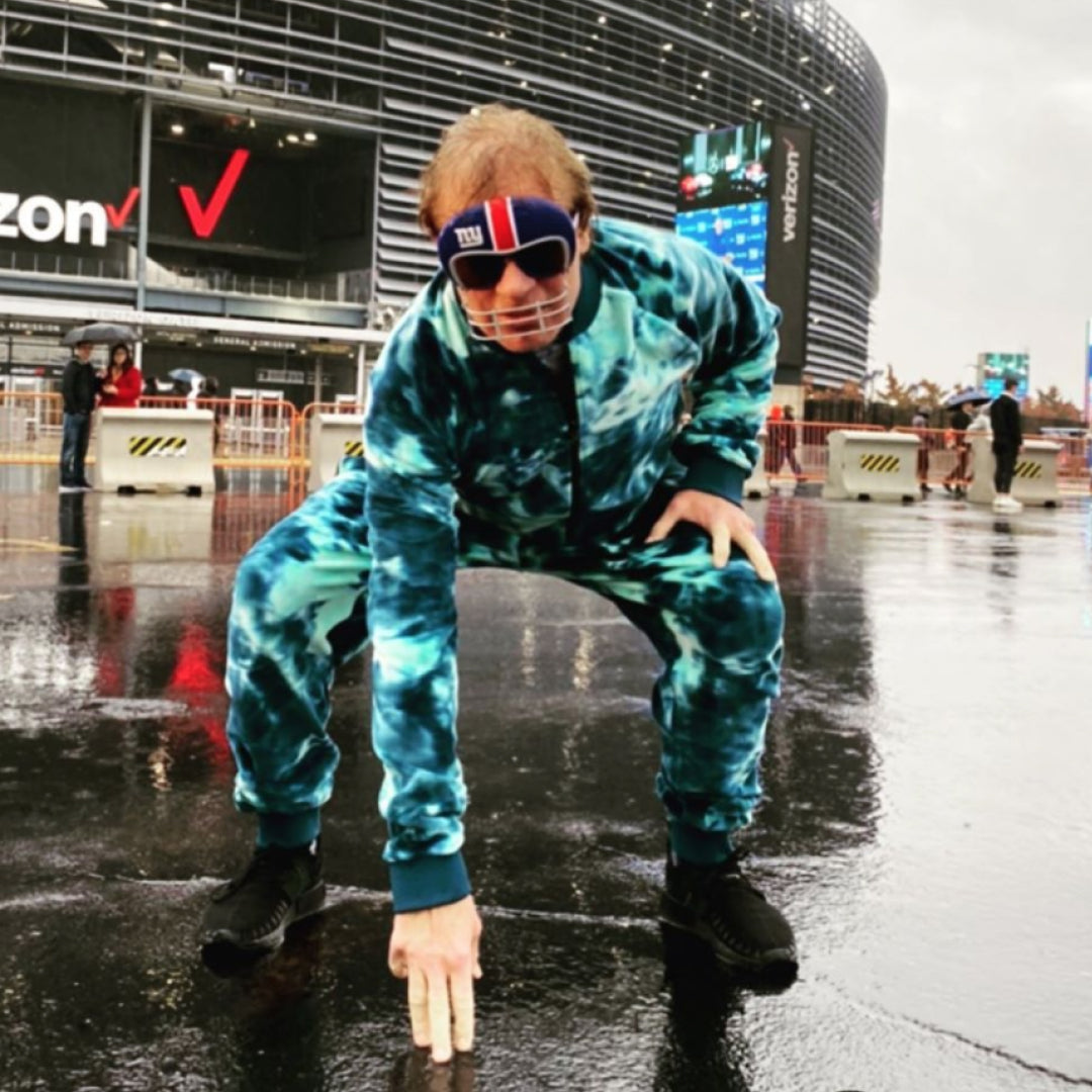 Jake poses in front the the Giants stadium in Mine77 