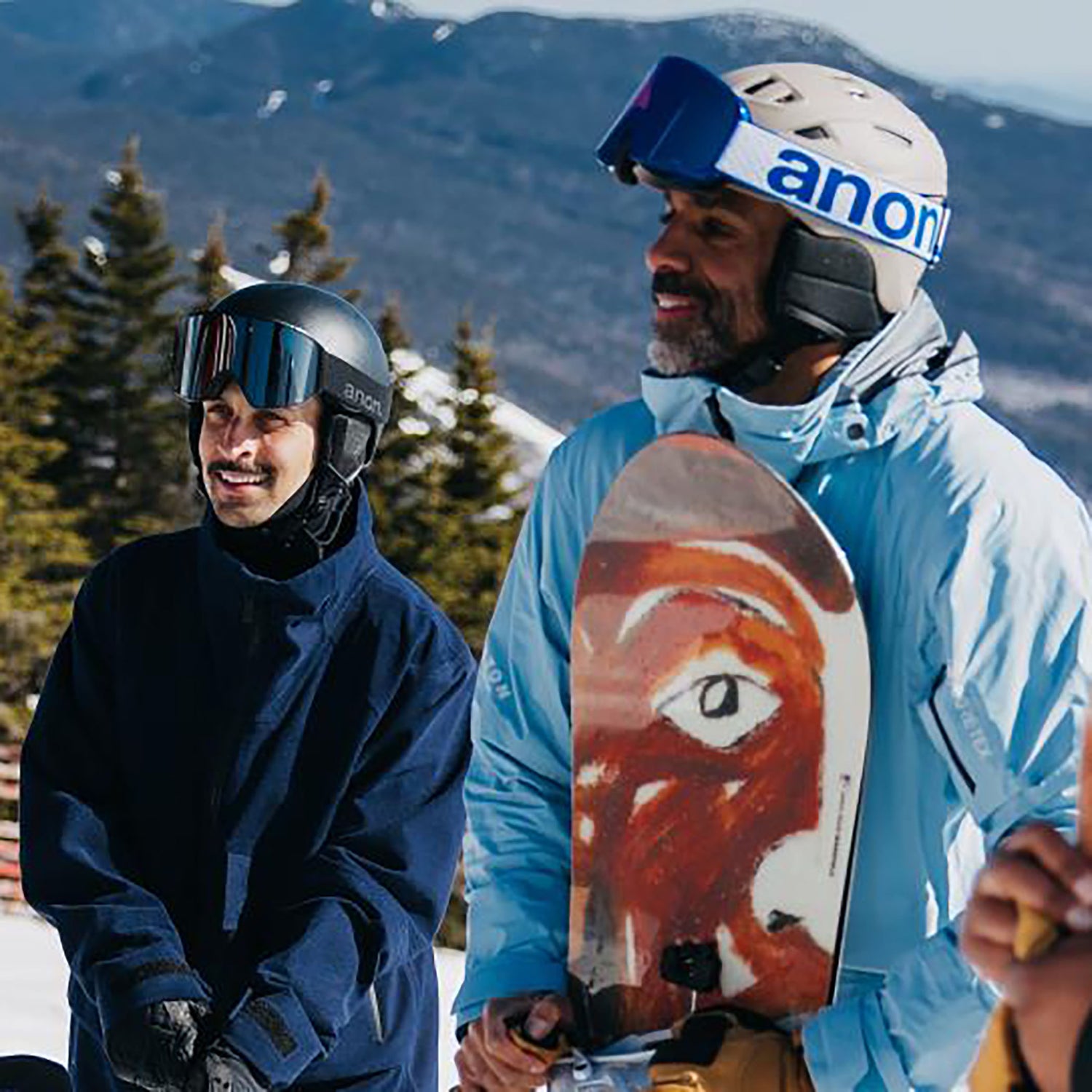 group of snowboarders connecting on the mountain