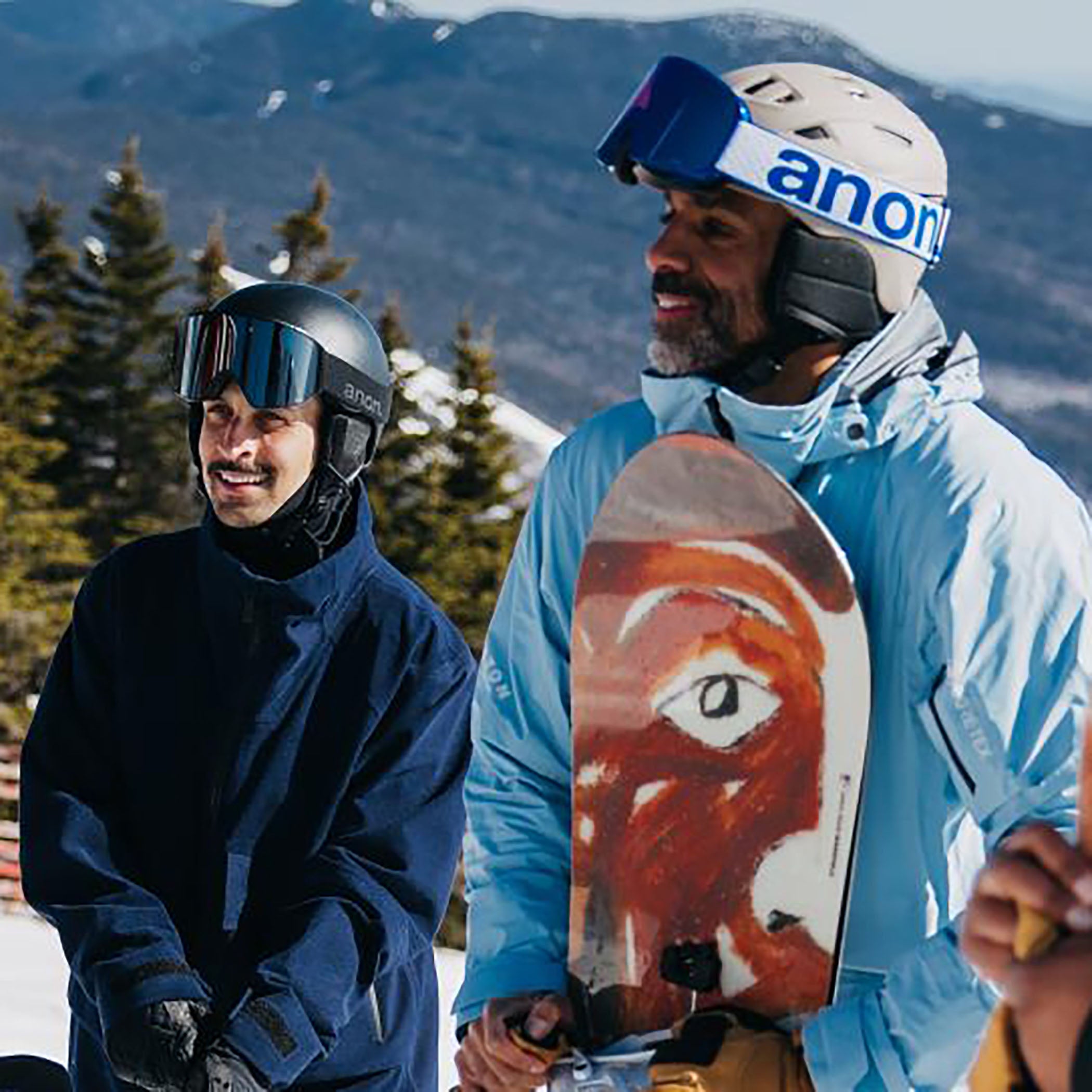 group of snowboarders connecting on the mountain