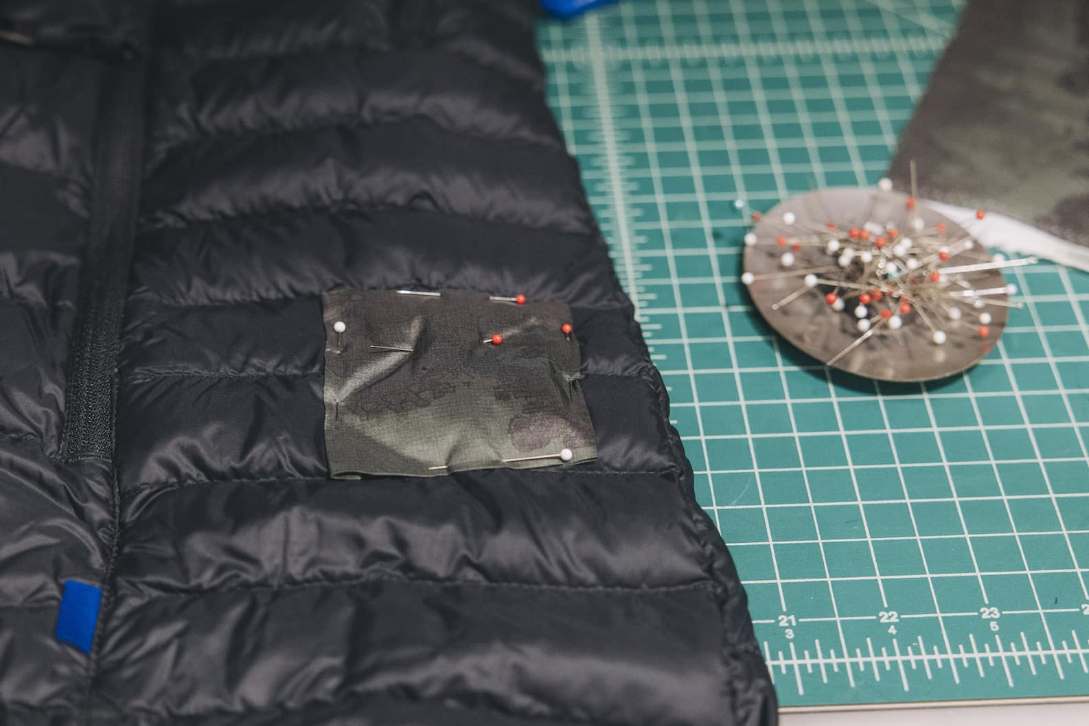 Got a hole in a puffer jacket? Here is how to easily patch it up